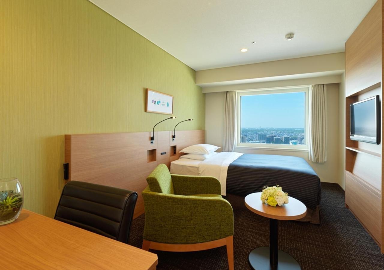 فندق إميسيا سابورو المظهر الخارجي الصورة A room at the hotel